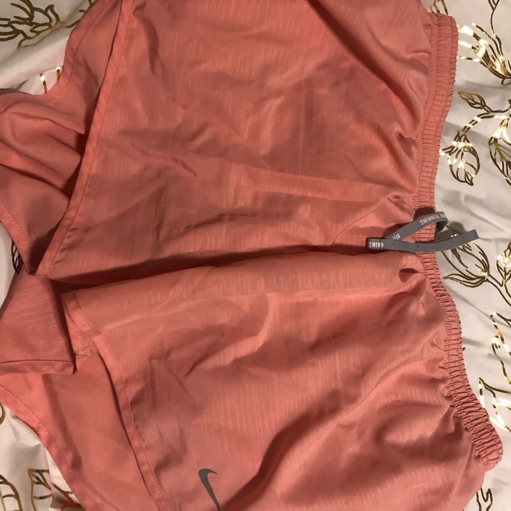 Peach/coral Nike tempo running shorts